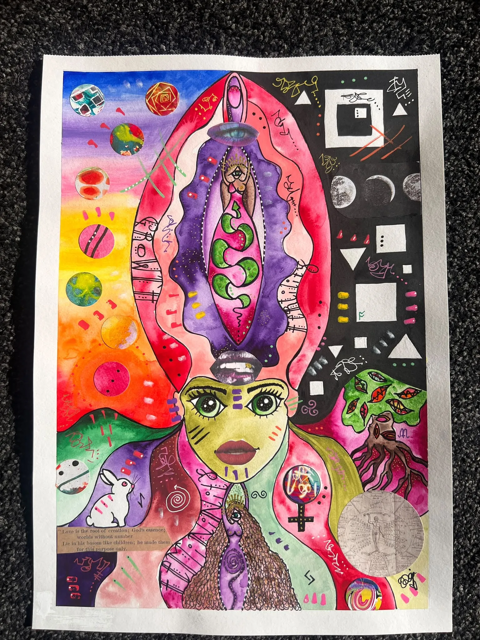 Colourful goddess with planets and a green serpent